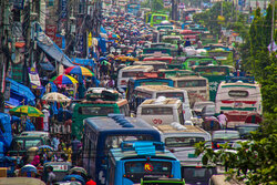 This picture features the CNG traffic of Dhaka, Bangladesh